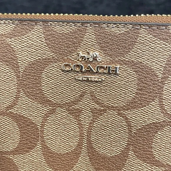 NWOT...Coach Tan and Brown Signature Wristlet - Picture 2 of 8